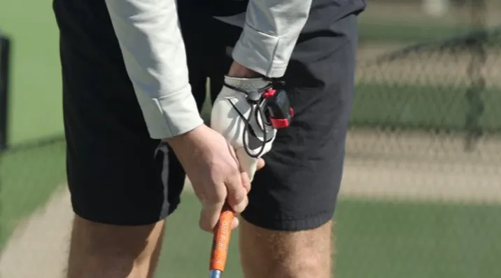 Bo coaching a student wearing K-Motion wrist sensor
